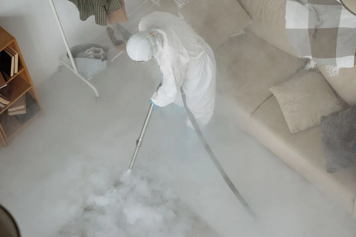 Biohazard cleanup technician in protective equipment, High Bridge, NJ